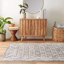 gray indoor geometric area rug