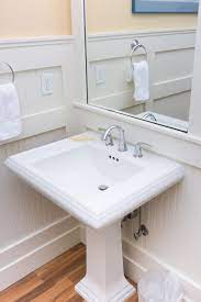 hide pedestal sink plumbing