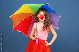 clown makeup and rainbow umbrella