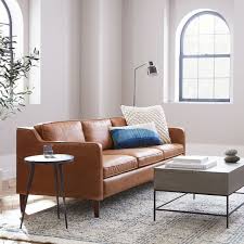 The warm tones of the sofa, combined with soft rich fabrics, such as wools and velvets, and medium to dark wood will keep the space from appearing too cold. Lauke Isskaityti Pirmadienis Leather Sofa Living Room Yenanchen Com