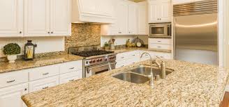 The streamlined backsplash complements the concrete countertops. Don T You Know Granite Slab Makes An Elegant Backsplash Granite Countertops In Maryland
