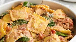 creamy ravioli with sausage and spinach