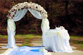 to decorate a wedding arch with fabric