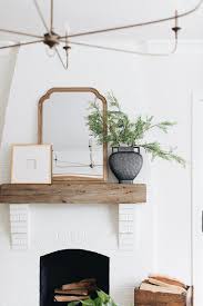 Round Geometric Mirror Over Fireplace