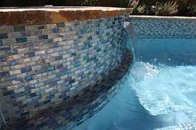 Glass Tile Surrounds The Pool