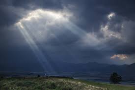 sun rays through clouds images