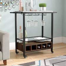 This storage cart has a very high practicality, be used as a kitchen cart, microwave cart, coffee cart, or bar cart. George Oliver Moshe Bar Cart Reviews Wayfair
