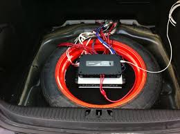 subwoofer in spare tire well jaguar