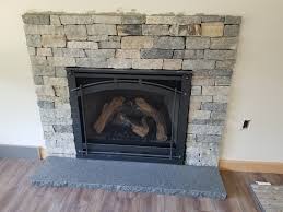Stone Veneer Over Brick Fireplace