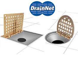 hinged floor drain grate for easy