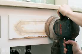 using wood filler to update cabinet doors