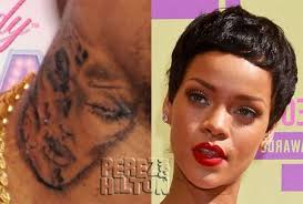 Then, riri immortalized her late grangran dolly in a massive tattoo under her boobies. Ourstage Magazine Think Before You Ink Chris Brown