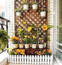 Nowadays, many people build houses more than one floor because they do not have enough places to expand to. 22 Smart Balcony Designs With Space Saving Furniture And Planters Small Balcony Garden Vertical Garden Design Small Balcony Garden Ideas