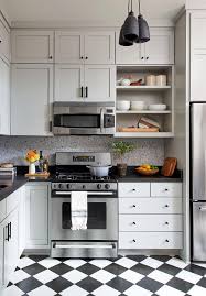 Install the corner wall cabinet first, with a helper. How To Install An Over The Range Microwave To Maximize Kitchen Space Better Homes Gardens