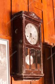 Antique Pendulum Wall Clock Stock Photo