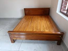 queen size teak wood cot without