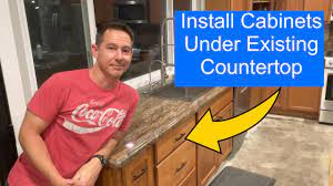 install cabinets under existing