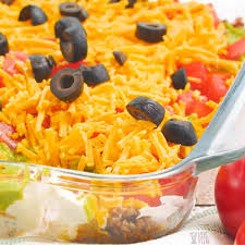 layered taco dip with ground beef a