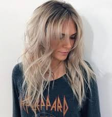 Layered long haircut for long straight hair with swoopy pieces. 50 Cute Long Layered Haircuts With Bangs 2020