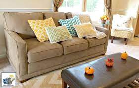 decorating a brown living room or sofa