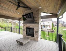 Covered Deck With Stone Fireplace Des