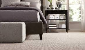 use laminate flooring or carpet