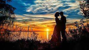 couple love sunset lake romantic