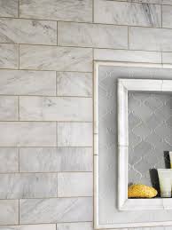 This contemporary master bath is elegant and inviting with an airy, sandy tile backsplash, blonde double vanity and natural stone floors. 10 Shower Tile Ideas That Make A Splash Bob Vila