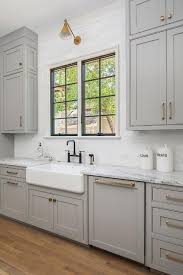 light gray cabinets with farmhouse sink