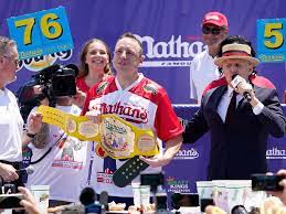 Joey chestnut with a new world record 76 hotdogs in 10 minutes. 5plrqwgsk1 Dm