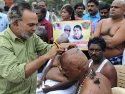 indian mourners shave heads for jayalalitha