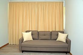 what color curtains go with a brown sofa