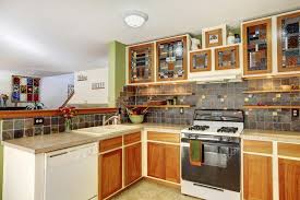 Bright Kitchen Interior With Brown Tile