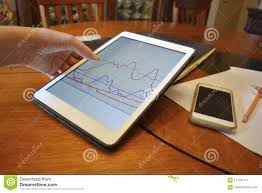 Business Charts On A Tablet And Other Devices Editorial