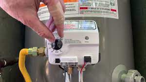 How to light the pilot on a Rheem gas water heater - YouTube