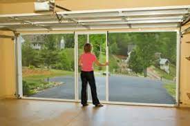 At about $10 a linear foot to build for four the breezy living garage screen system is a fully retractable screen door for your garage that works in conjunction with your existing garage door. Garage Door Screen The Basics For A Diy Project Coastal Garage Doors