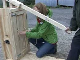 how to use a hand hay baler you