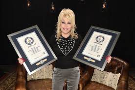 dolly parton earns two 2018 guinness