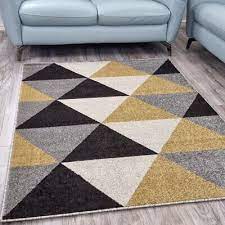 modern geometric rug gold grey dark