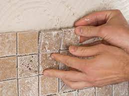 Remove the faceplate and install the backsplash around the outlet first. How To Install A Kitchen Tile Backsplash Hgtv