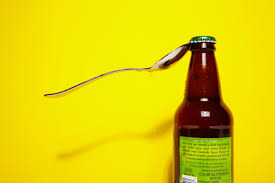 You need to use both hands as one is. 10 Ways To Open A Beer Bottle With Random Objects