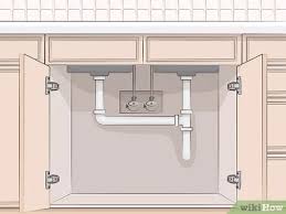 Similarly, if you were to remove a thick tile floor from the majority of the kitchen but left the tile underneath your cabinets, you might find that your countertops are too high. 3 Ways To Remove Kitchen Cabinets Wikihow