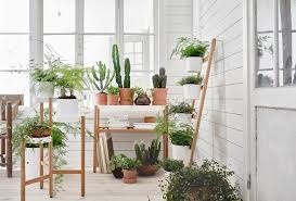 This indoor plant stand is appropriate for rooms with little spaces. 15 Plant Stands That Raise The Bar For Stylish Interior Decors