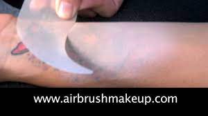 tattoo with dinair airbrush makeup