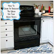 clean an oven door in between the glass