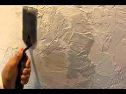 repair a textured wall or ceiling with
