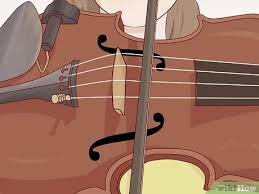 The trick is to keep the bow hair flat and in this middle position as you draw it across the strings. 3 Easy Ways To Keep A Bow Straight On A Violin Wikihow