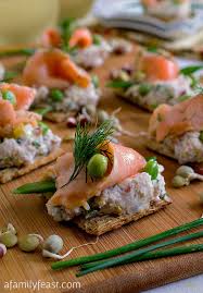 ceviche salmon and peas on triscuit