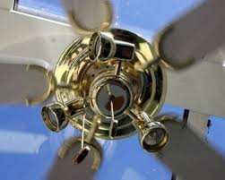 a ceiling fan on a sloped ceiling