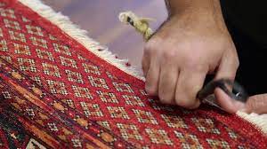repairing the fringes of a persian rug